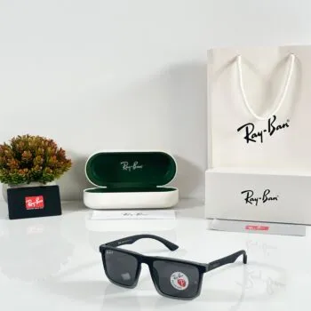 Shop Premium Carbon Fiber Style Sunglasses. Lightweight Tech frame, rectangular shape, and UV400 grey lenses for high-performance style.