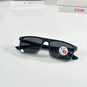 Shop Premium Carbon Fiber Style Sunglasses. Lightweight Tech frame, rectangular shape, and UV400 grey lenses for high-performance style.