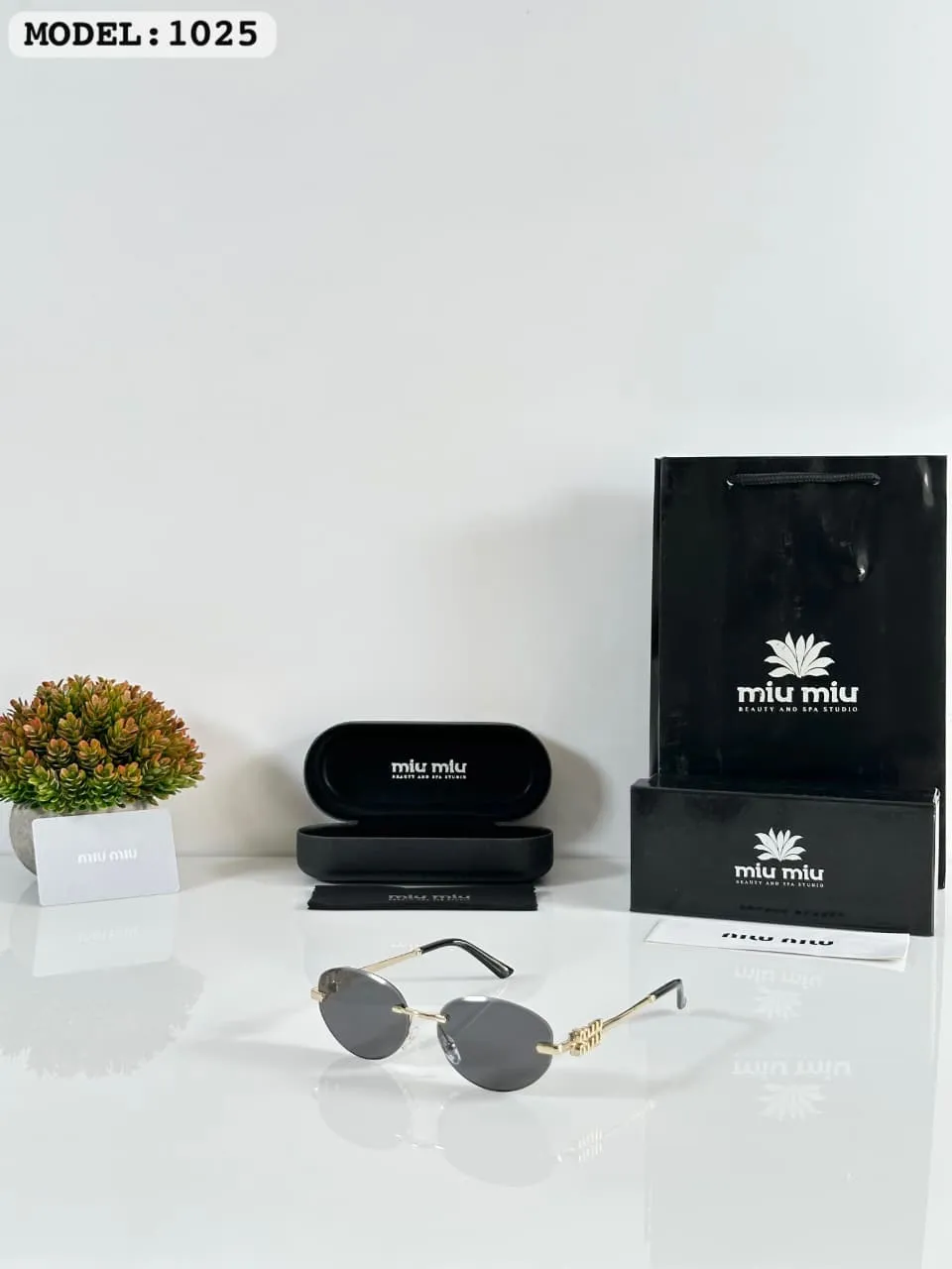 Premium Gold Rimless Oval Sunglasses – Women's Luxury Edition