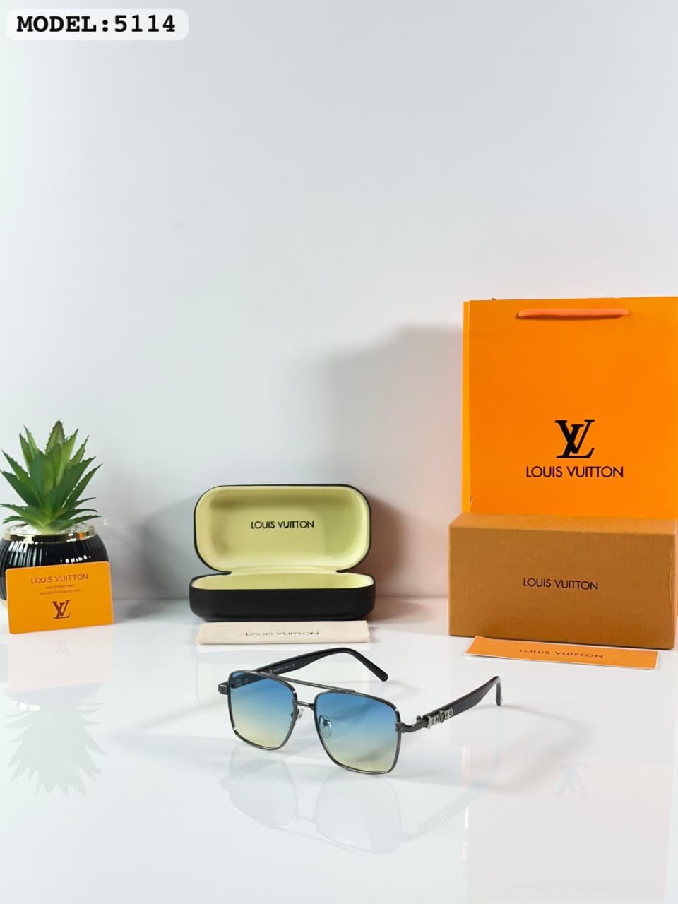 Premium Gunmetal Blue Sunglasses (1) Premium Gunmetal Blue Sunglasses – Luxury Aviator Edition