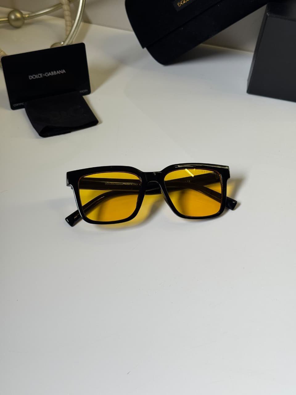 Classic Black Frames – Amber Lens Style (3) black rectangular eyewear with amber-colored lenses