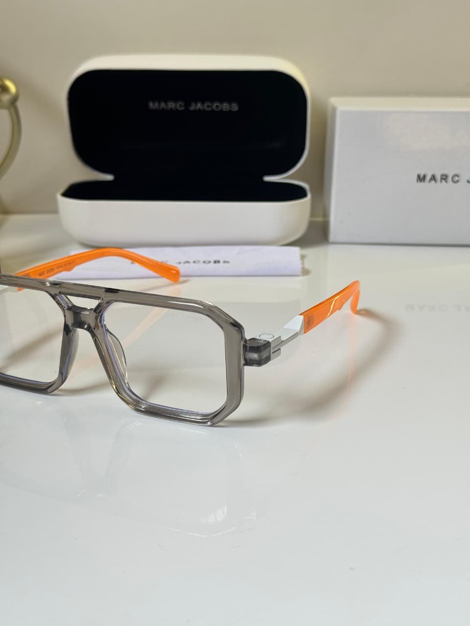 Grey Square Eyeglasses – Orange Accent Frame (2) Grey square eyeglasses with orange accent temples