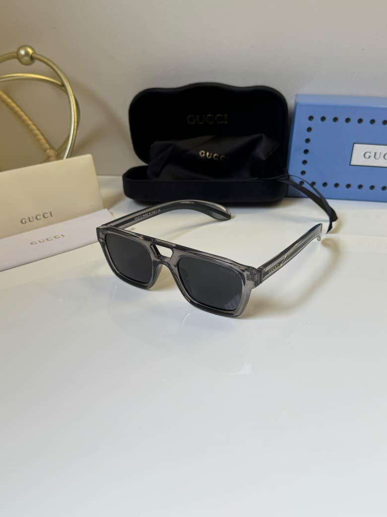 Smoke Grey Transparent Frame – Dark Lens Rectangular Shades (1) Smoke Grey Transparent Frame – Dark Lens Rectangular Shades