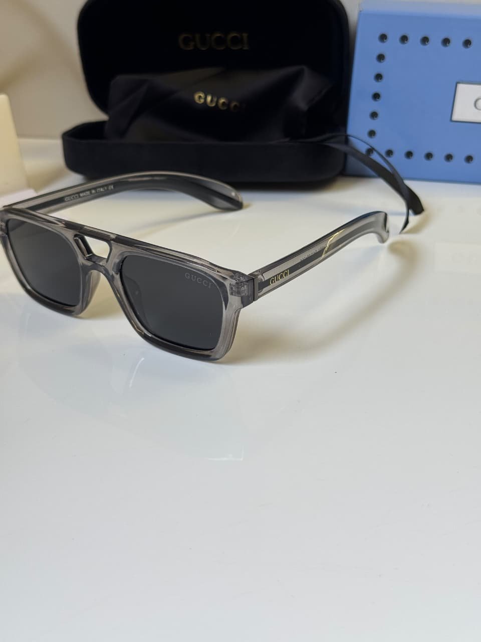 Smoke Grey Transparent Frame – Dark Lens Rectangular Shades (2) Smoke Grey Transparent Frame – Dark Lens Rectangular Shades