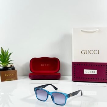 transparent blue rectangular eyewear with gradient tinted lenses