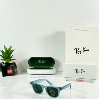 Translucent blue square sunglasses with dark green lenses