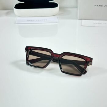 Dark brown rectangular sunglasses with brown-tinted lenses and metallic temple accents