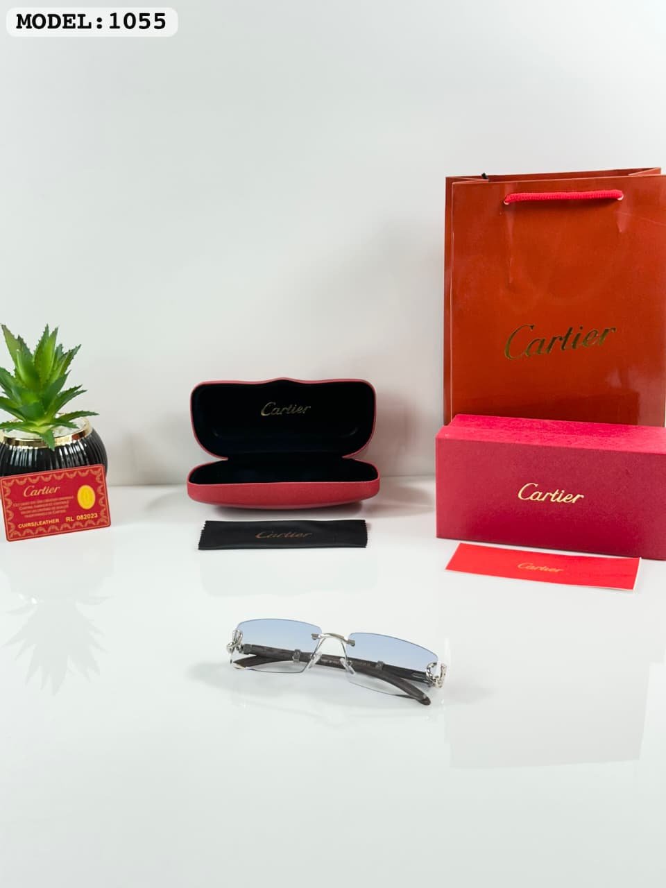 Silver Rimless Sunglasses – Blue Gradient Lenses (1) Silver rimless sunglasses with rectangular light blue tinted lenses