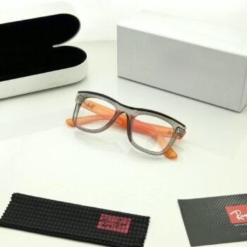 Transparent grey rectangular eyeglass frames with bright orange temples